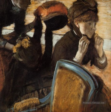 Au Milliners 3 Edgar Degas Peinture à l'huile